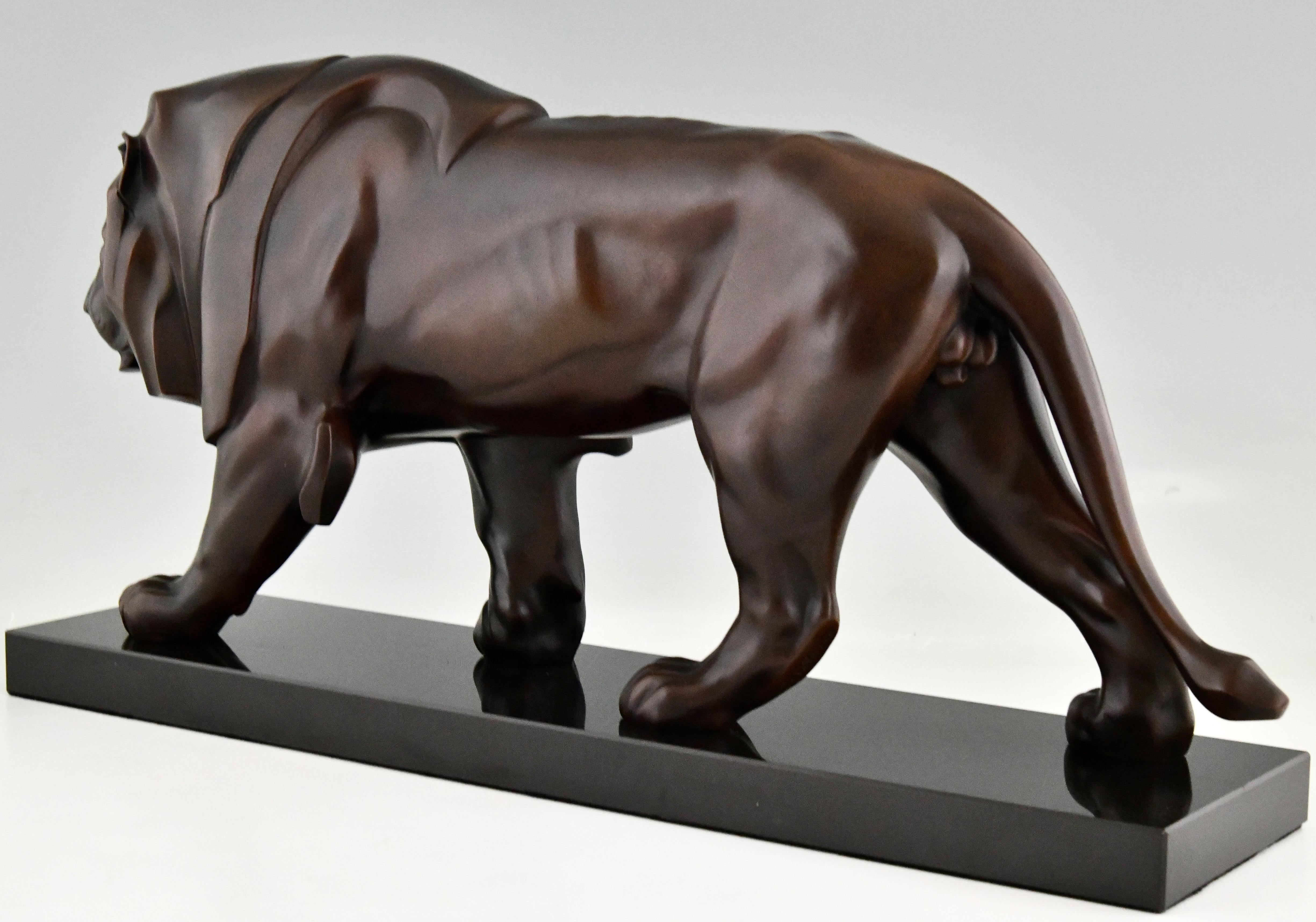 Patinated Art Deco Style Sculpture of a Walking Lion by Max Le Verrier original, France For Sale