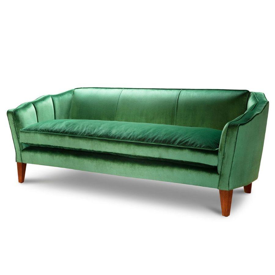 This striking, three seater sofa by Beaumont & Fletcher takes inspiration from the popular Art Deco period. Traditionally handcrafted in England, the Josephine sofa is upholstered in a luxurious, emerald green Italian silk velvet with a stylish