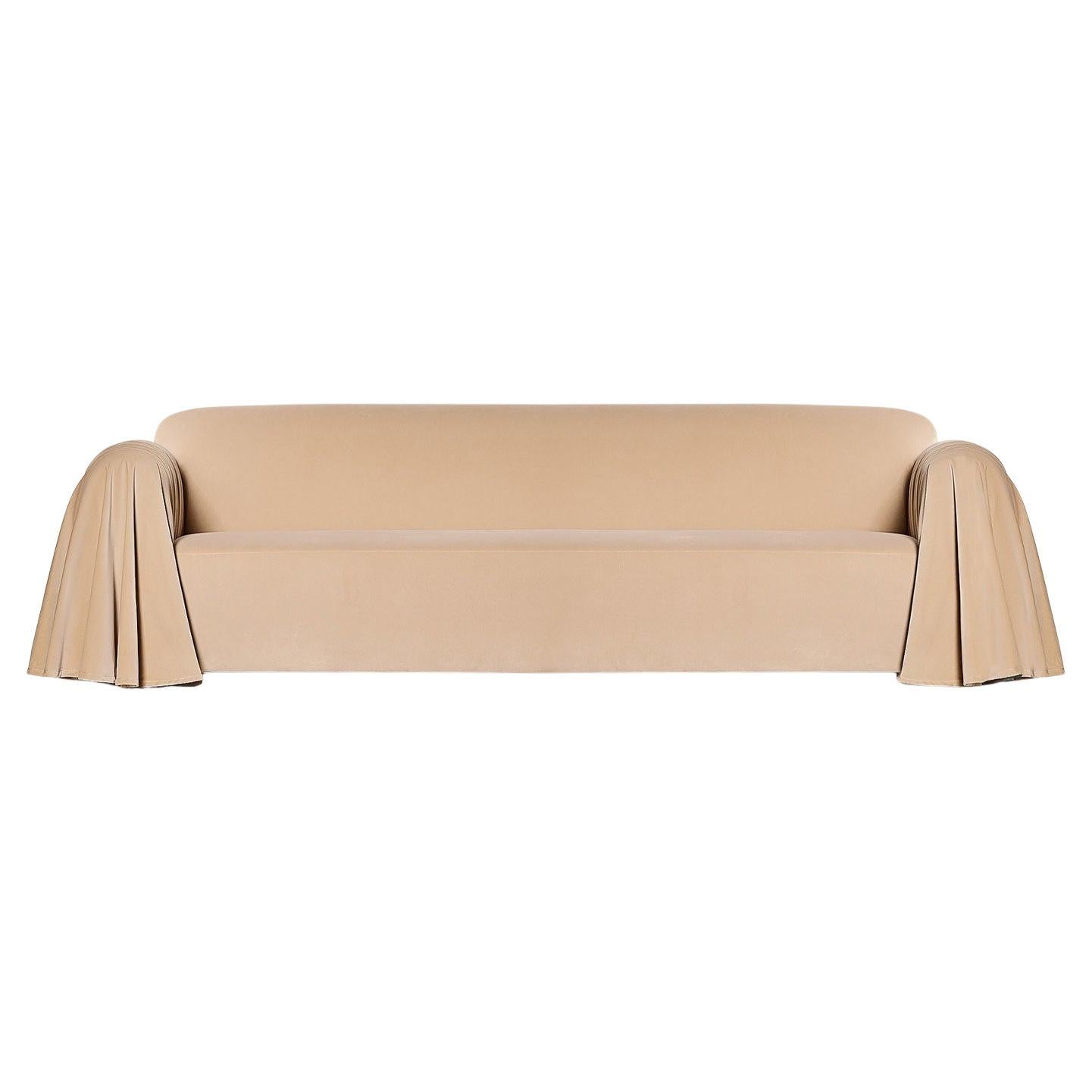 Evoking the bold and historic strength of Scotland's kilts, this Sofa makes a powerful statement. Its design captures the essence of the kilt's dynamic folds, resulting in a comfortable piece with a striking visual presence, especially in the detail