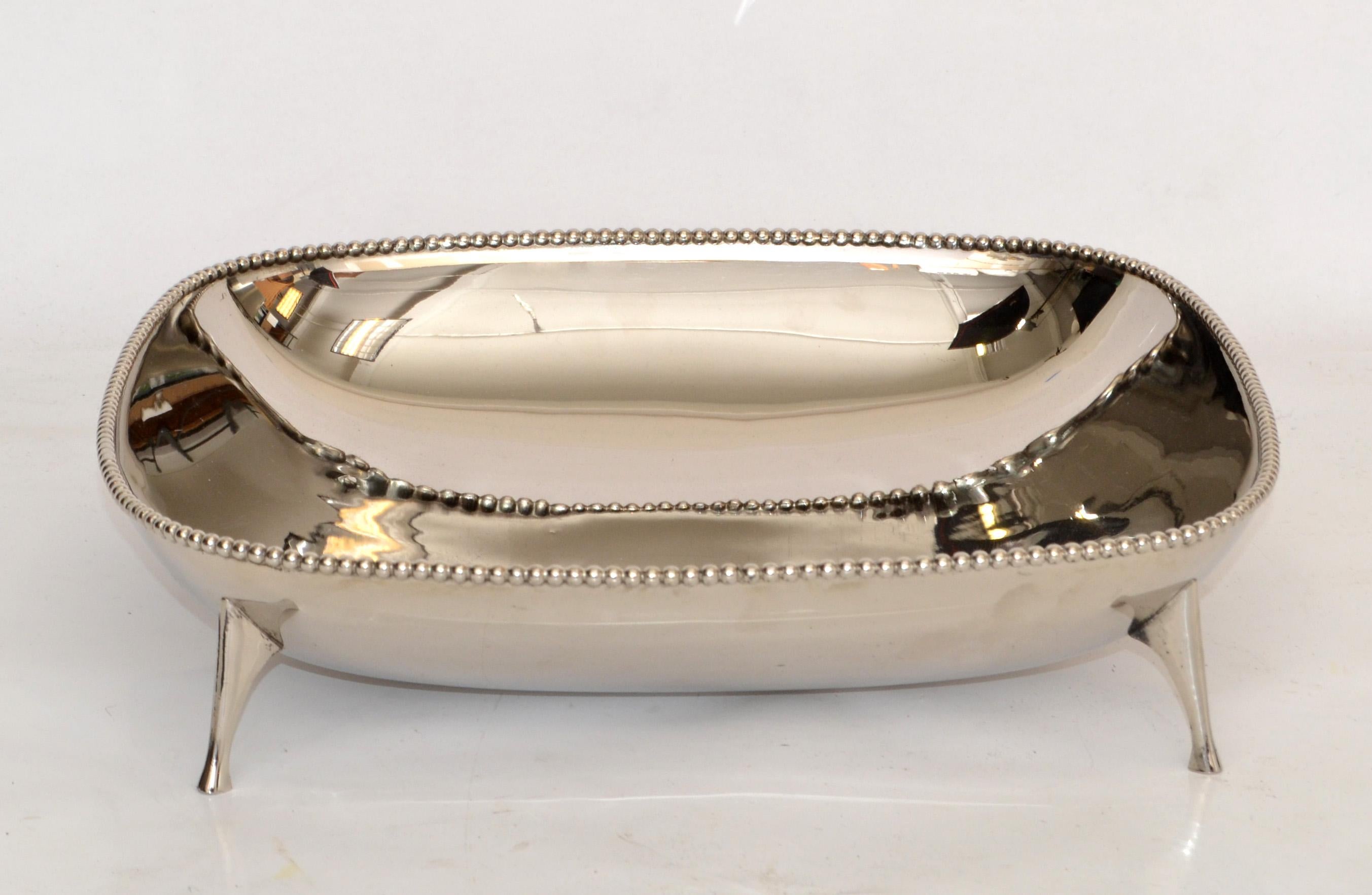 Charming Art Deco square shaped footed bowl Silver Plated Steel and with silver ball Border.
Great for your coffee table display or as a centerpiece.
The Bowl has been recently polished.