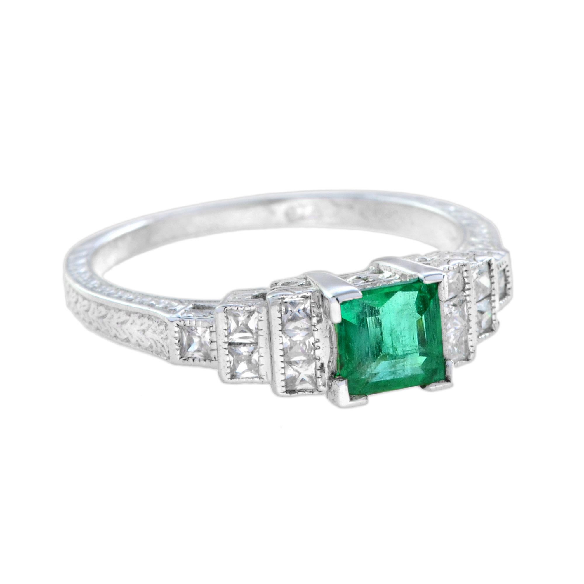 A stunning emerald and diamond ring. This beautiful ring features an elegant square emerald center with sparkling square diamonds on either side. Set in a stylish 18K white gold stepped mount. An exquisite ring that will transform any outfit,