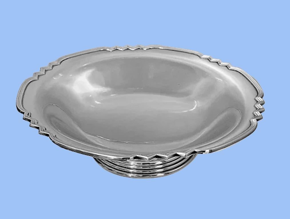 Art Deco style sterling bowl, Birmingham 1960, Walker and Hall. The bowl on ribbed pedestal foot, flared plain body, upper deco design border. Measures: Diameter: 10 inches. Height: 3 inches. Weight: 562.75 grams.