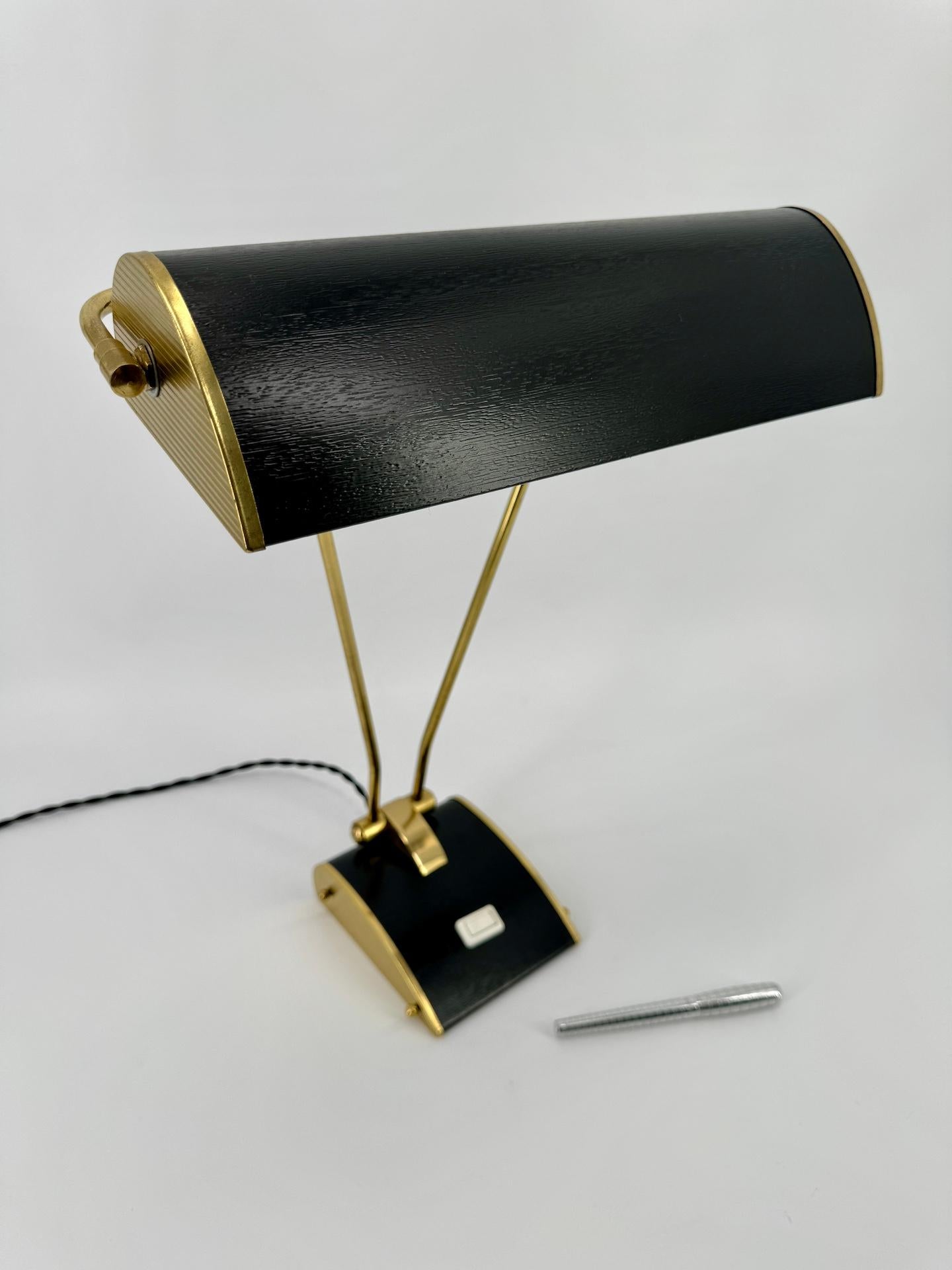 Mid-20th Century Art Deco Style Table Lamp by JUMO in Black And Brass Finish France Circa 1950
