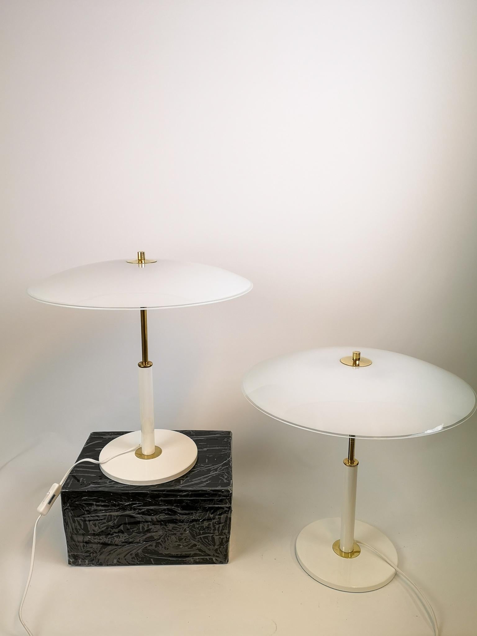 Wonderful table lamp made in Sweden and produced for Ikea in the 1980 and 1990s. This lamp gives an impression of being in the Art Deco period. These lamps are sold as one lamp. 

Good and working condition.

Measures H 47 cm D 32 cm.
  