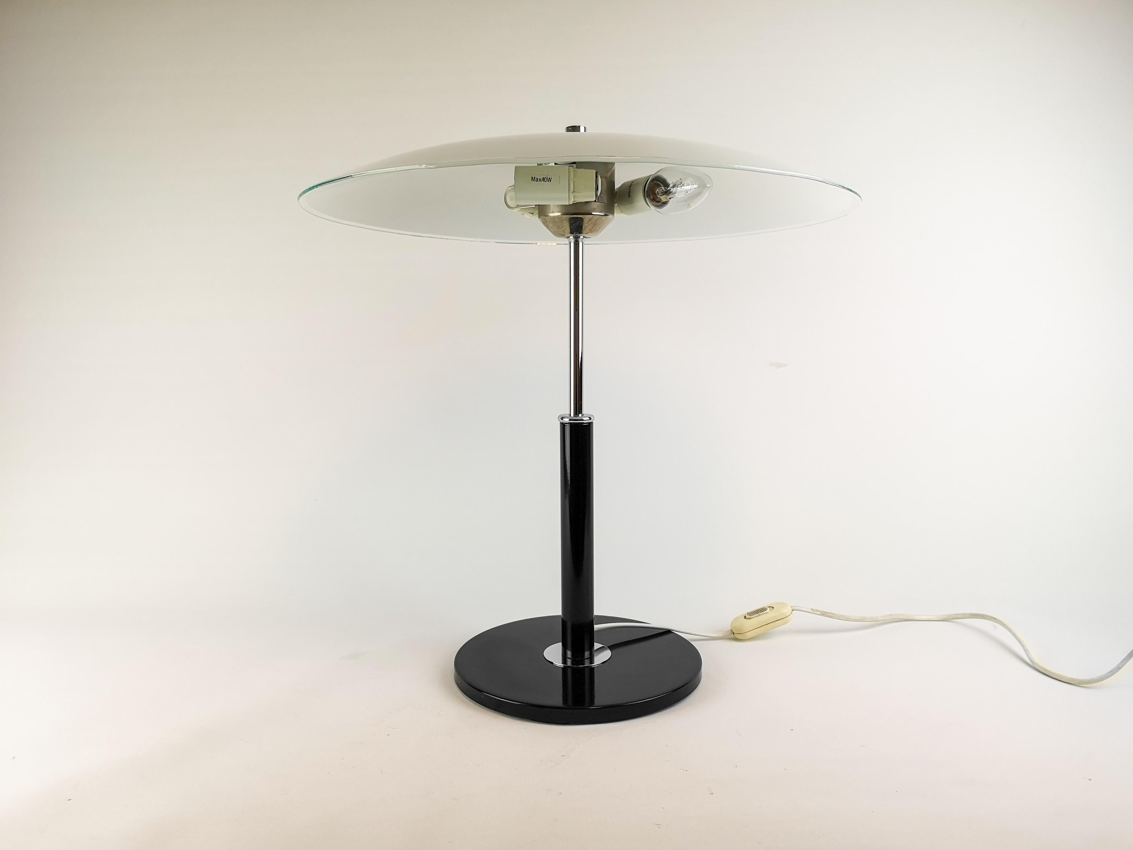 Wonderful table lamp made in Sweden and produced for IKEA in the 1970s. This lamp gives an impression of being in the art deco period. 

Good and working condition.

Measures H 47 cm, D 32 cm.
 