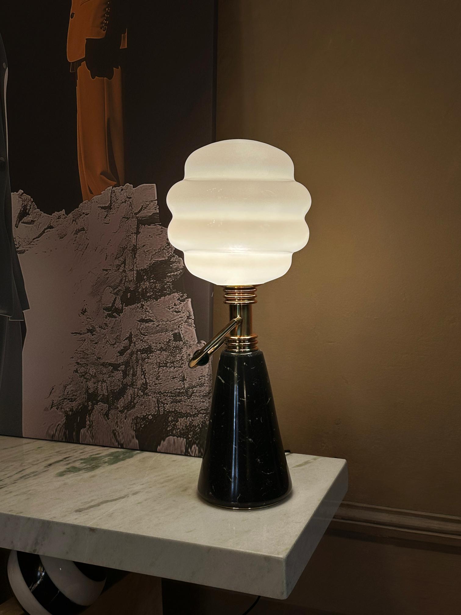 Luminous table lamp revives the timeless shapes from the ’30s, balancing bold and elegant forms. A design table lamp is a classic reinterpretation turned into a modern, outrageous table lamp.

Materials: Width: 24 cm  9.4 in – Depth: 24 cm  9.4 in –