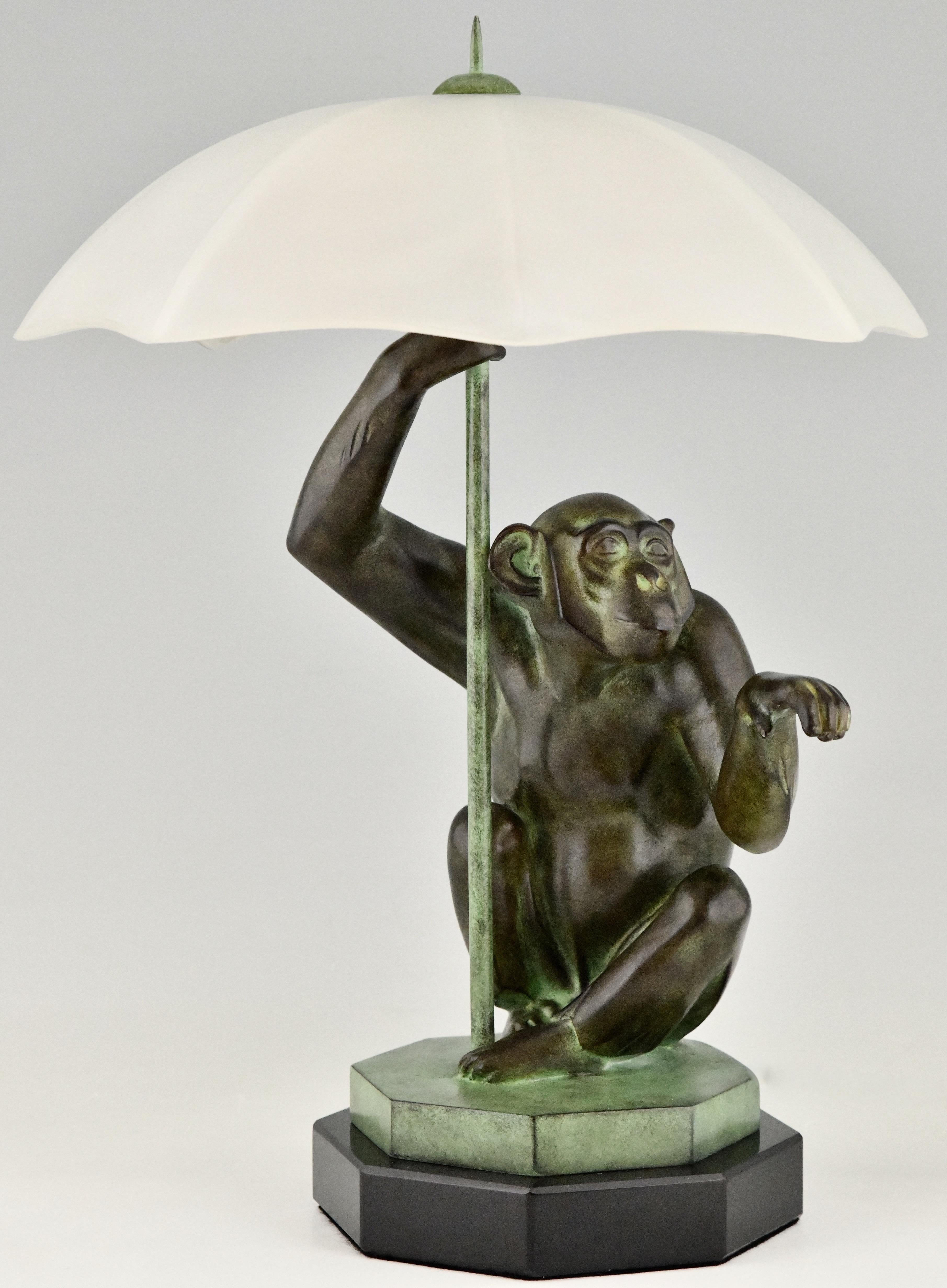 monkey holding umbrella lamp