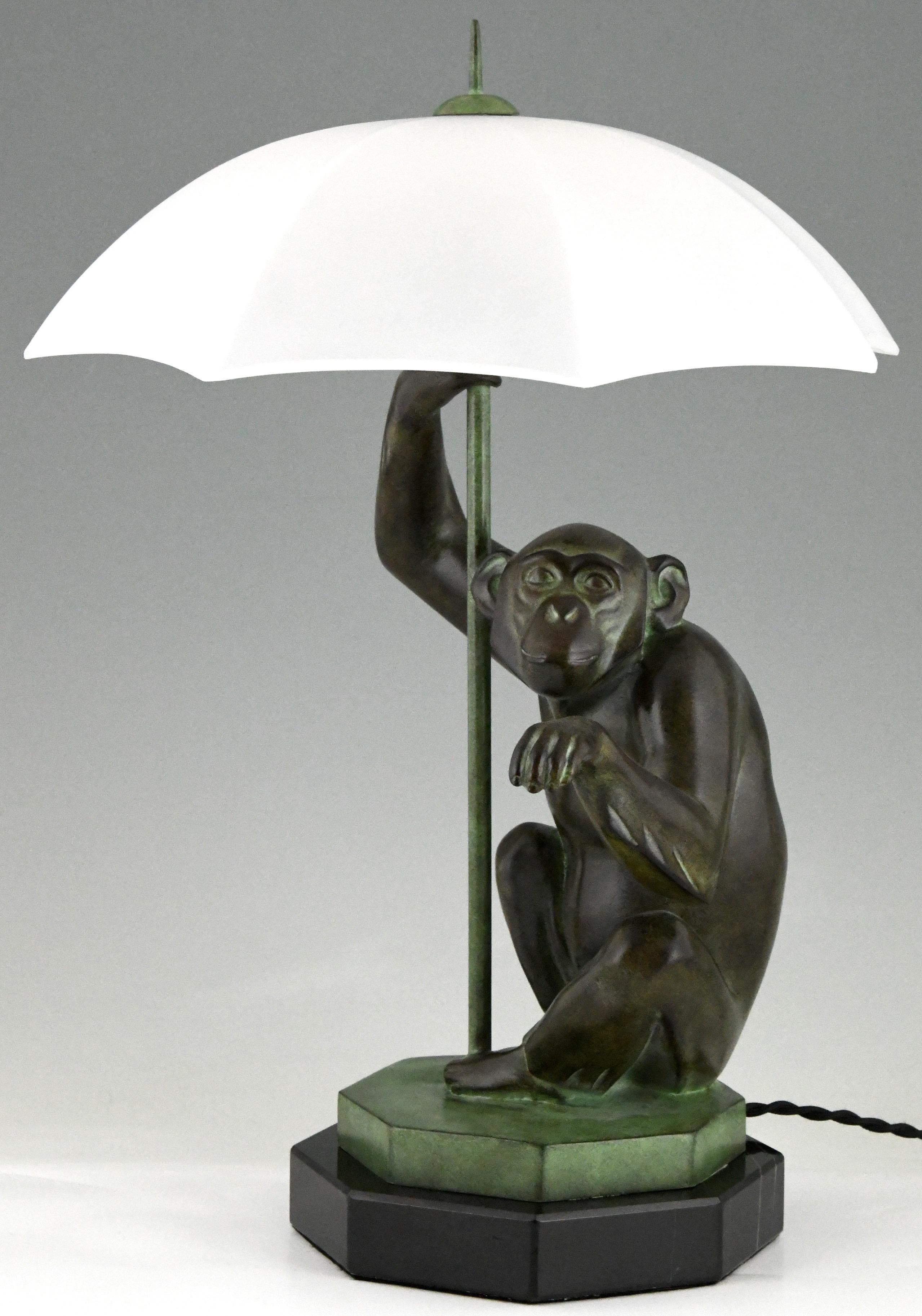 monkey holding umbrella