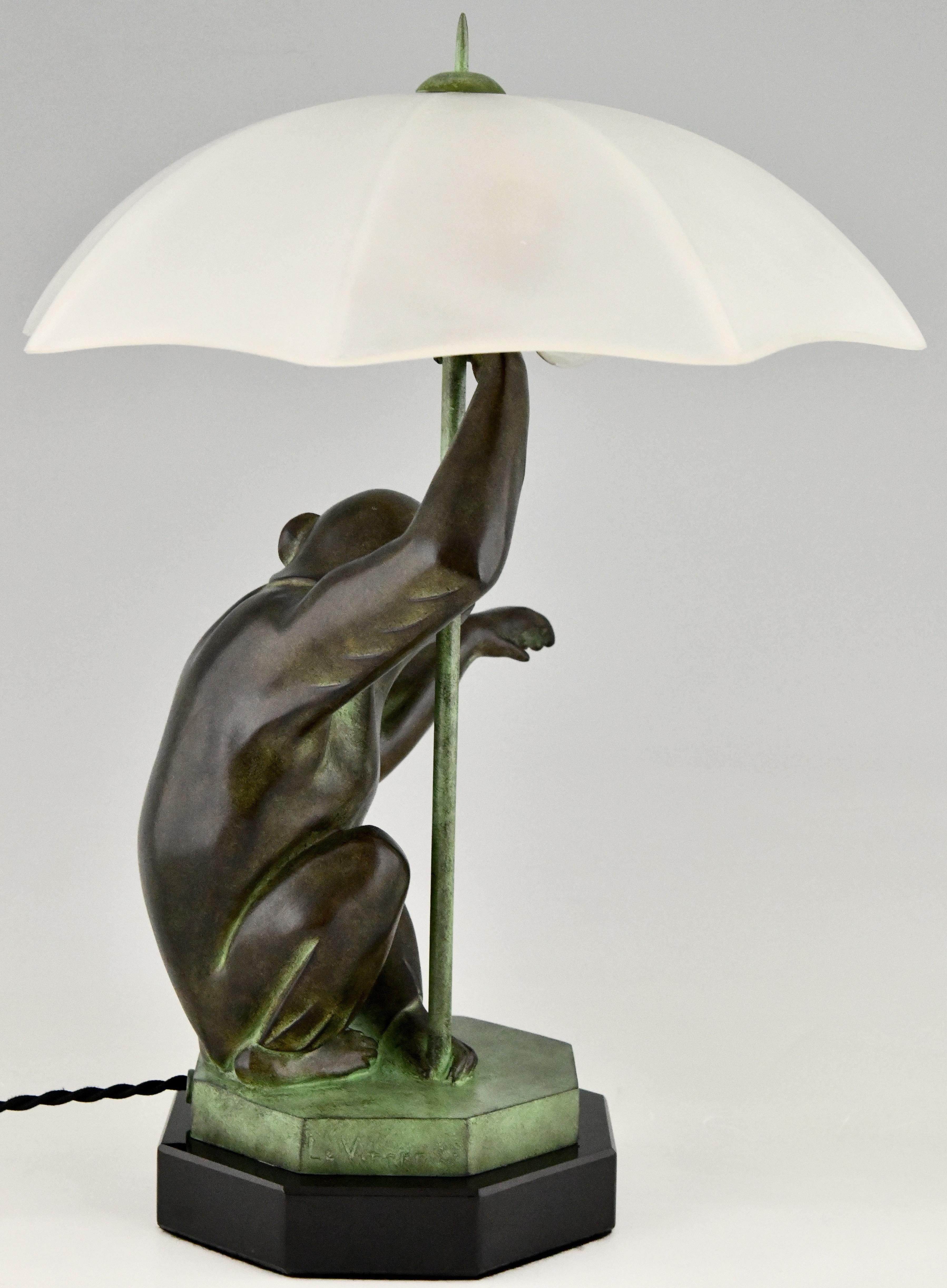 Hand-Crafted Art Deco Style Table Lamp Monkey with Umbrella by Max Le Verrier, France For Sale
