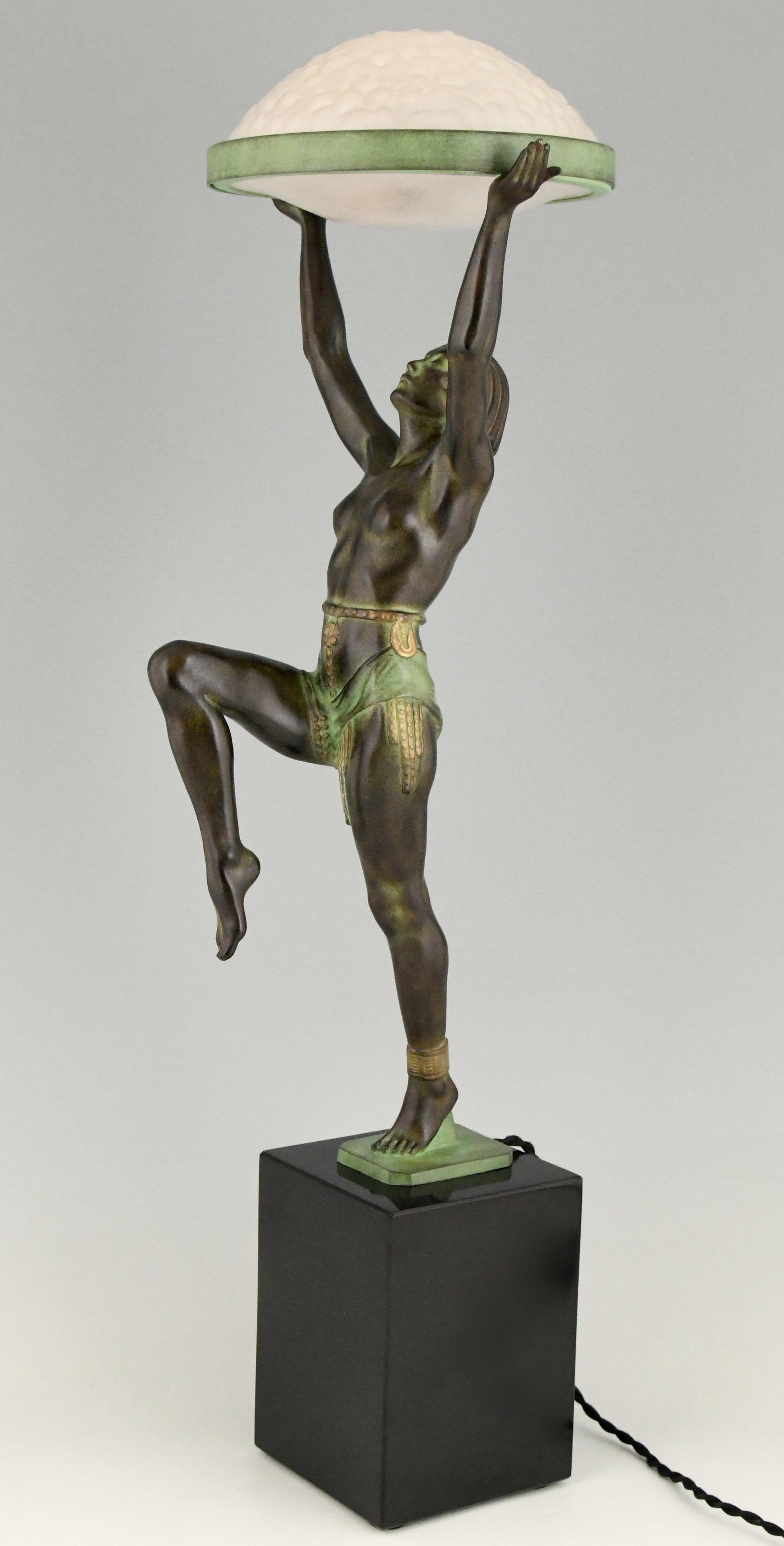 French Art Deco Style Table Lamp of a Dancer Holding a Glass Shade Max Le Verrier For Sale