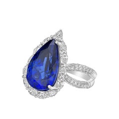 Sunita Nahata Art Deco Style Tanzanite Ring with Diamond in 18 Karat White Gold.