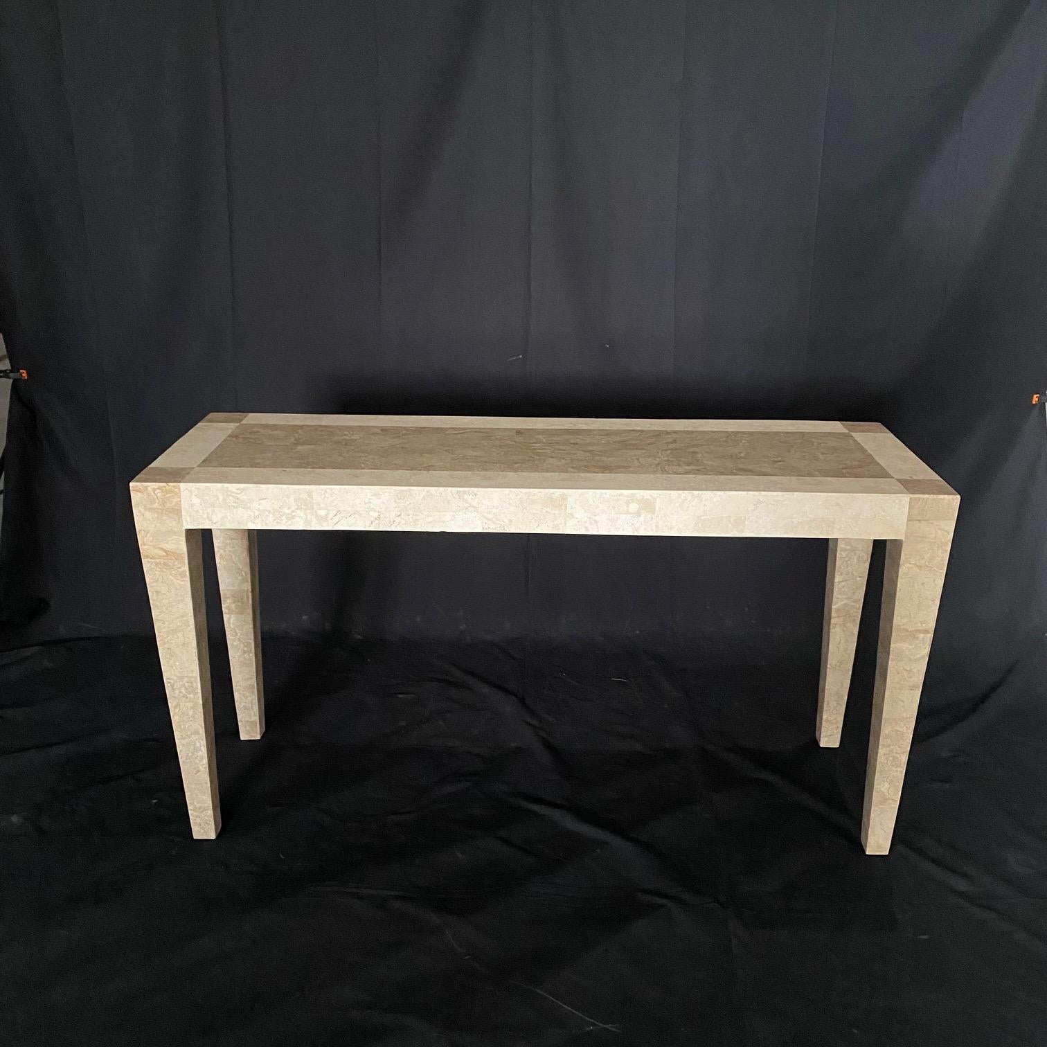 A vintage marble tessellated stone veneer console table featuring lovely off white and beige colored marble with inlaid borders.

#2802.