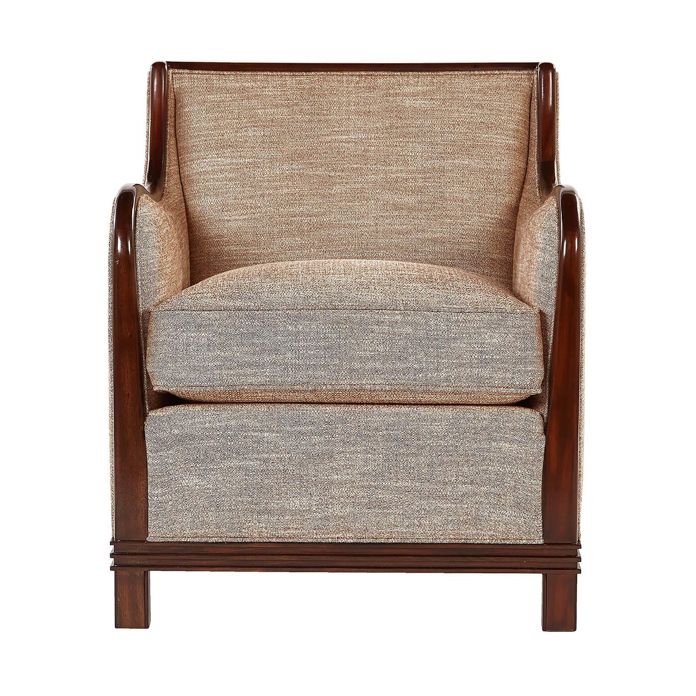 An Art Deco style upholstered armchair. Inspired by the 1930's French design, this chair has sloping wood arms and lines trimmed in mahogany.

Shown in 1241-94 fabric
Shown in Cambridge finish
COM is available
Dimensions:
27.5