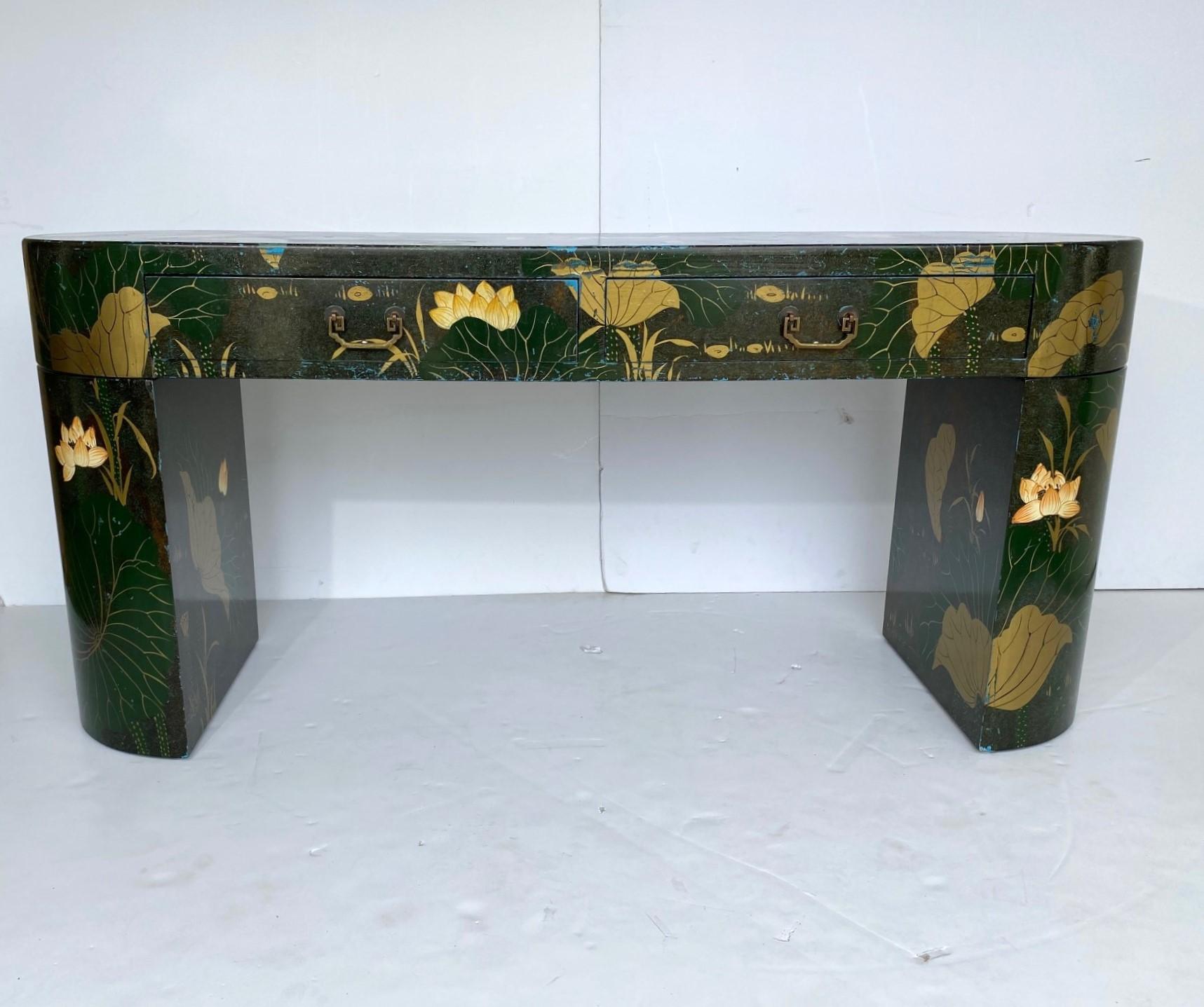 Art Deco Style vanity and stool. The vanity has a pattern of leaves, flowers, and a duck. It has two drawers and a matching stool.