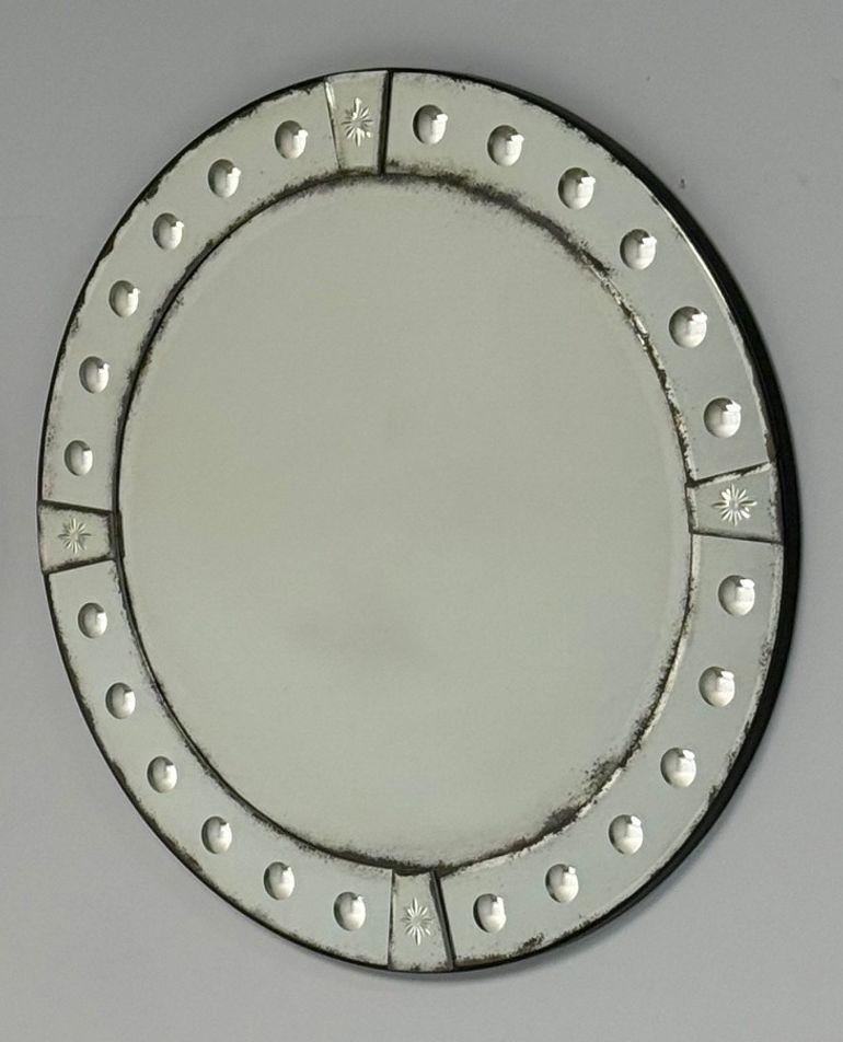 Art Deco Style, Venetian Circular Wall Mirrors, Antiqued Beveled Glass, 21st C.

Unique pair of circular antiqued wall mirrors that are perfect for placement above a console table, bedside tables, or atop a fireplace mantle. These striking