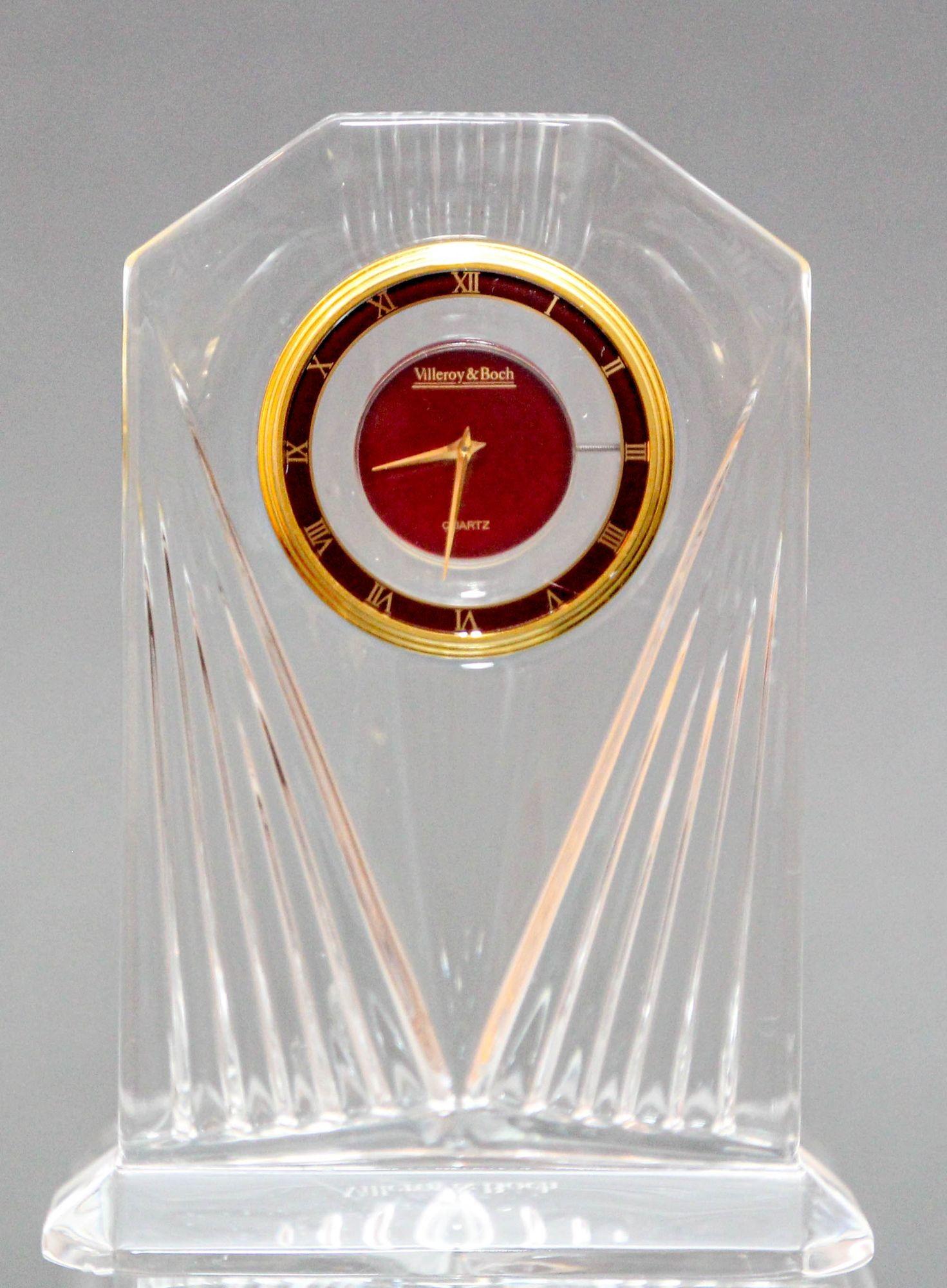 Art Deco style Villeroy & Boch Crystal Quartz Clock Paperweight 1970s.
Signed with a marked with needle-etched Villeroy and Boch at the base.
Clear crystal glass this elegant art crystal glass desk clock is a remarkable piece of art, reflecting