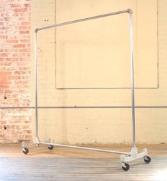 Art Deco Style Vintage Clothing Rolling Garment Rack