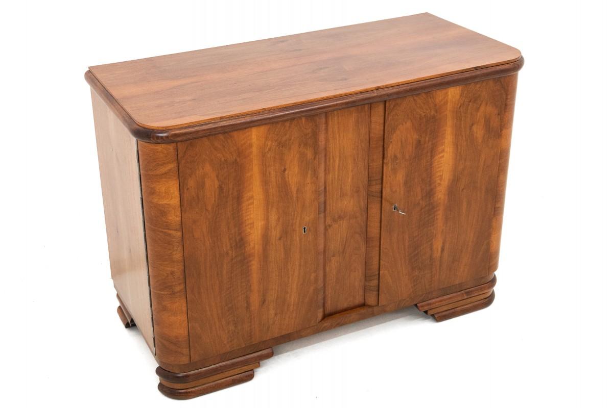 Polish Art Deco style walnut chest of drawers, Poland, 1950s. For Sale