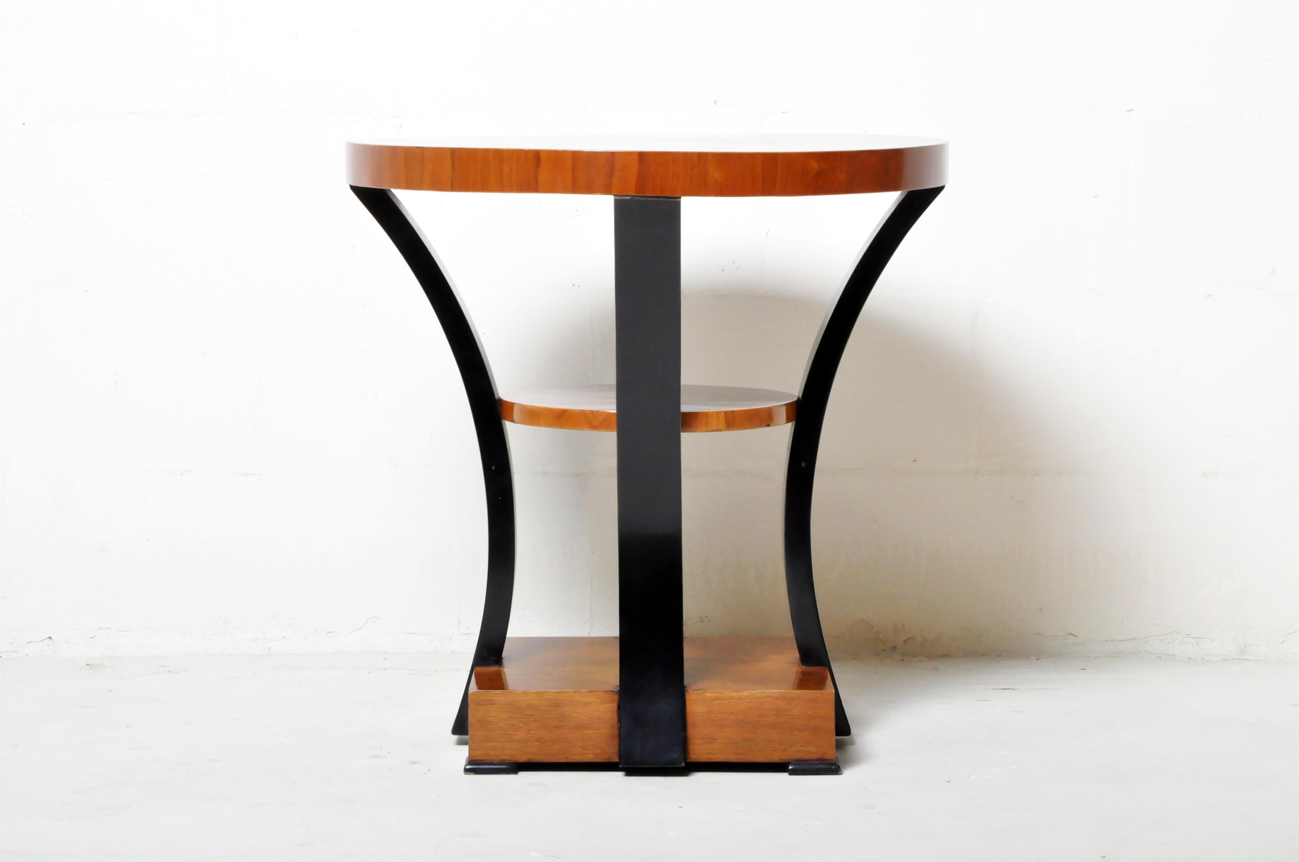 This elegant Art Deco style side table is from Budapest, Hungary, and was made from walnut veneer, c. 21st century.