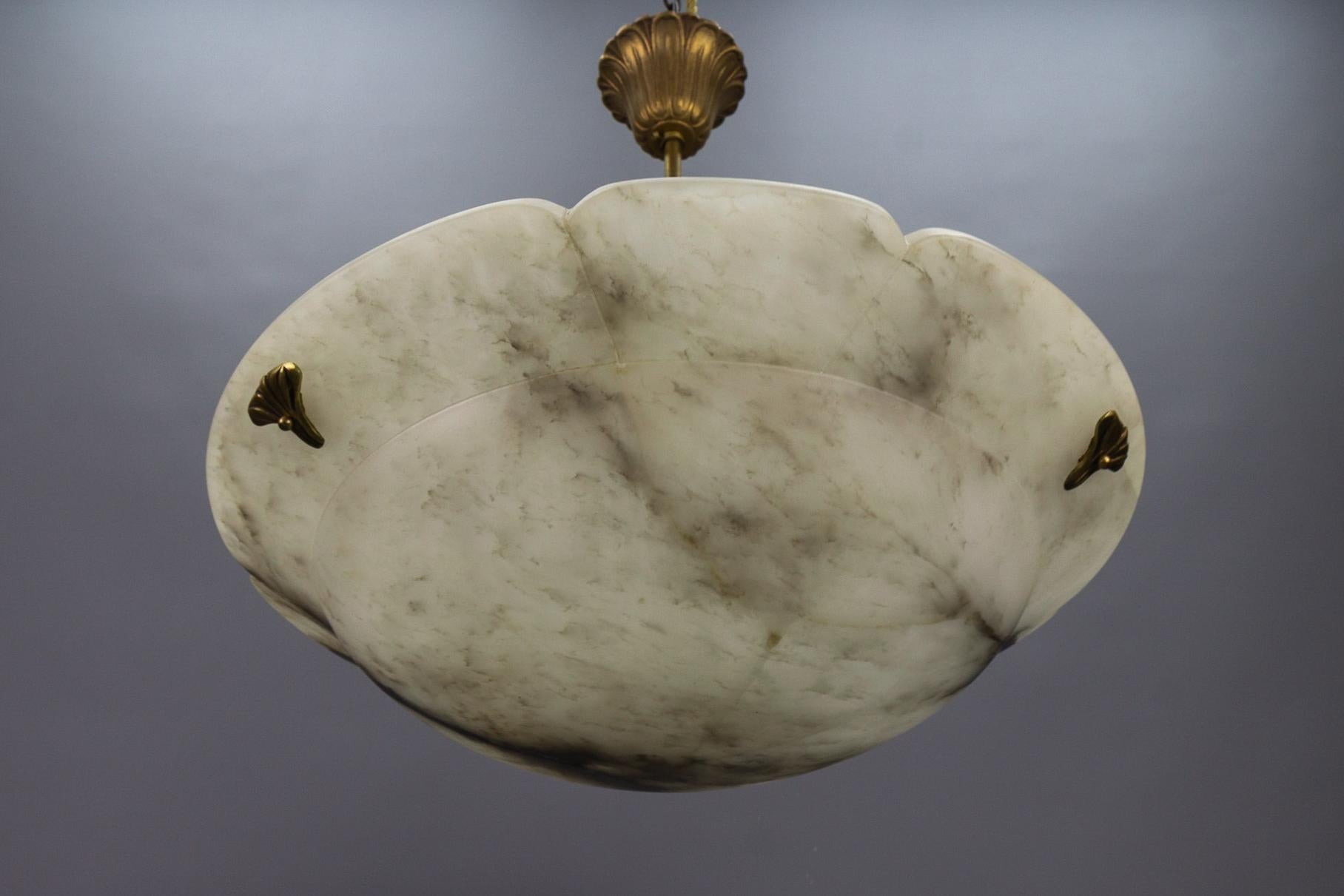 Mid-20th Century Art Deco Style White and Black Alabaster and Brass Pendant Light