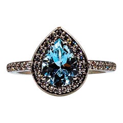 Bague cocktail en or blanc de style Art déco avec aigue-marine et diamants blancs taille brillant