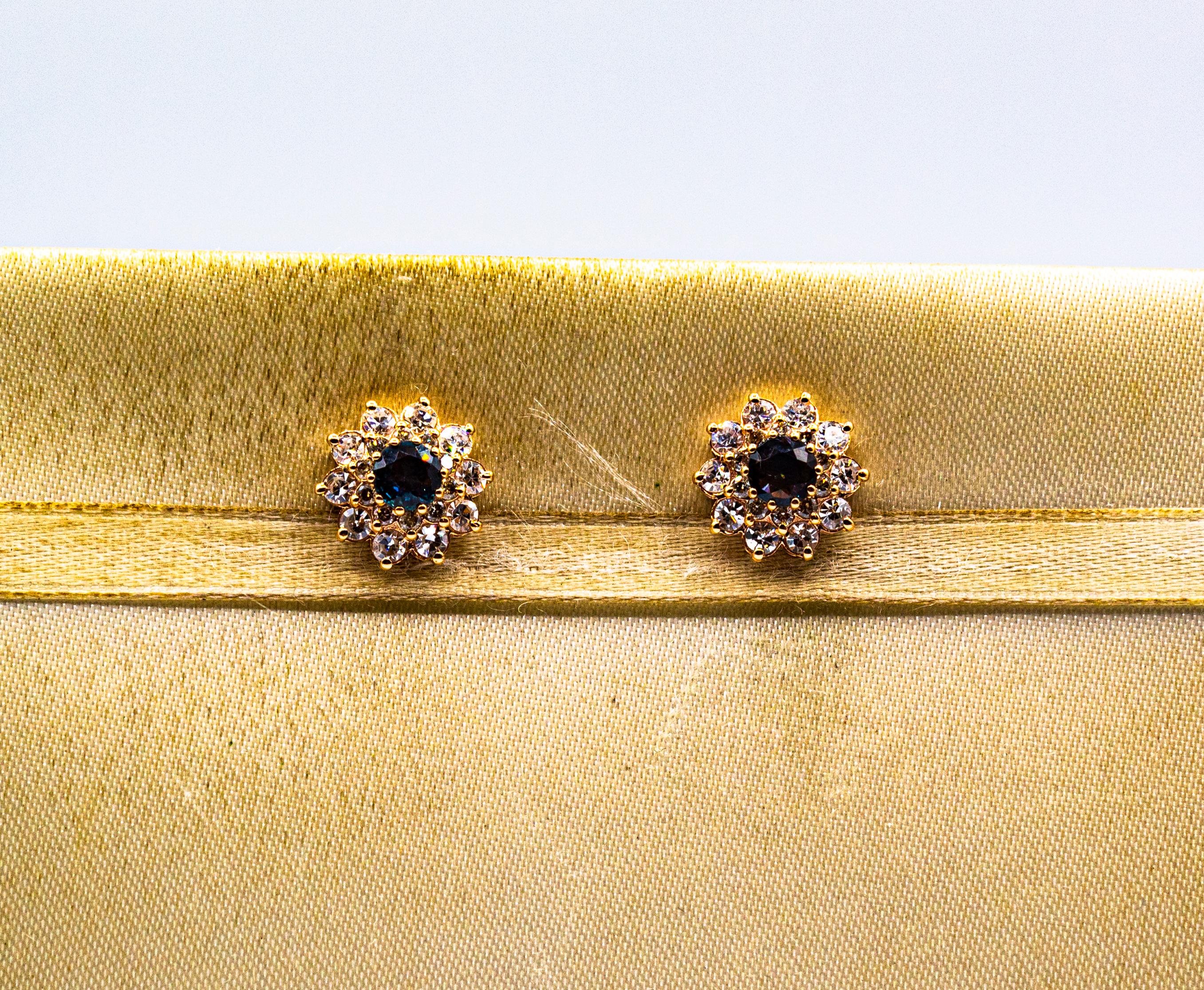 These Earrings are made of 14K Yellow Gold.
These Earrings have two 0.52 Carats Blue Sapphires (1.04 Carats in total).
These Earrings have 1.20 Carats of White Brilliant Cut Diamonds.

These Earrings are available also with central Rubies, Emeralds
