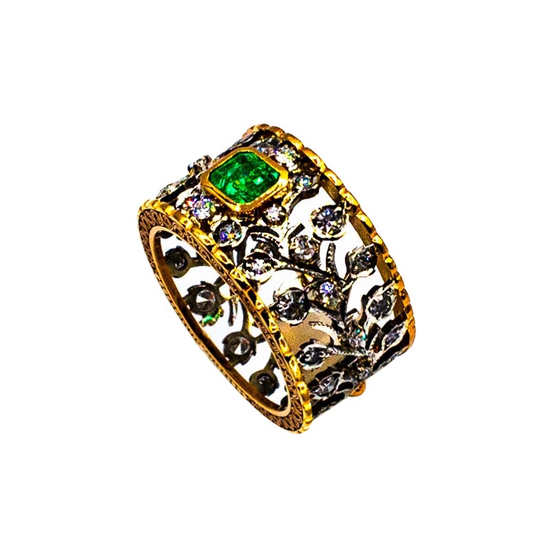 Gelbgoldring im Art-déco-Stil mit weißem Diamanten im Brillantschliff und Smaragd im Brillantschliff im Angebot