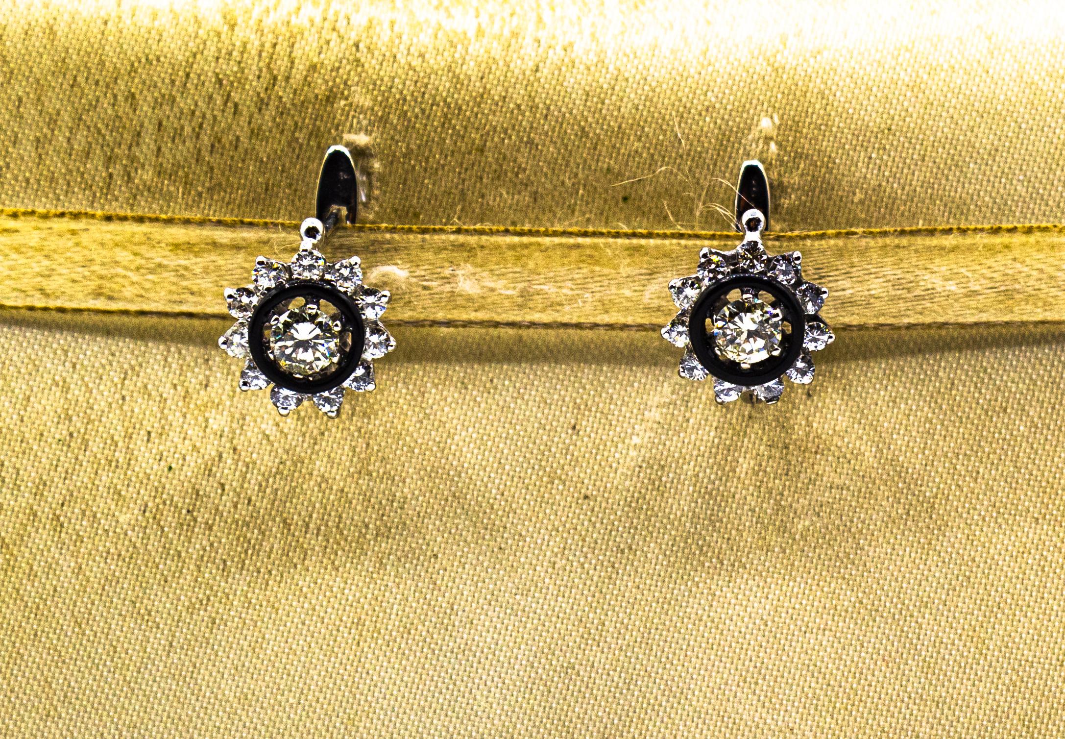 These Earrings are made of 18K White Gold.
These Earrings have 0.50 Carats of central White Brilliant Cut Diamonds. (0.25 Carats each one)
These Earrings have 0.55 Carats of lateral White Brilliant Cut Diamonds.
These Earrings have also