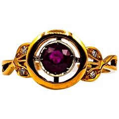 Anillo de cóctel de oro amarillo con diamante rubí talla brillante blanco estilo art déco