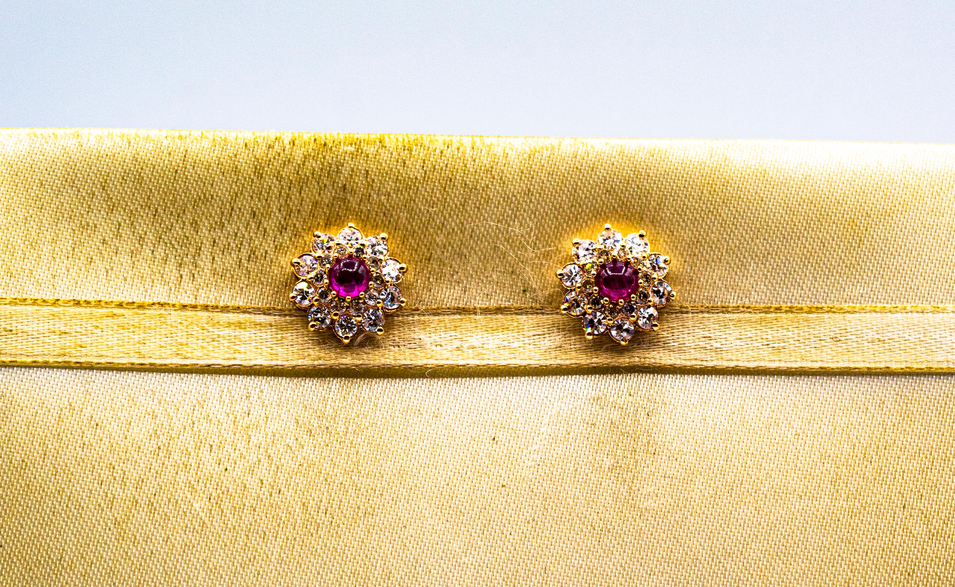 These Earrings are made of 14K Yellow Gold.
These Earrings have two 0.30 Carats Cabochon Cut Rubies (0.60 Carats in total).
These Earrings have 1.20 Carats of White Brilliant Cut Diamonds.

These Earrings are available also with central Blue