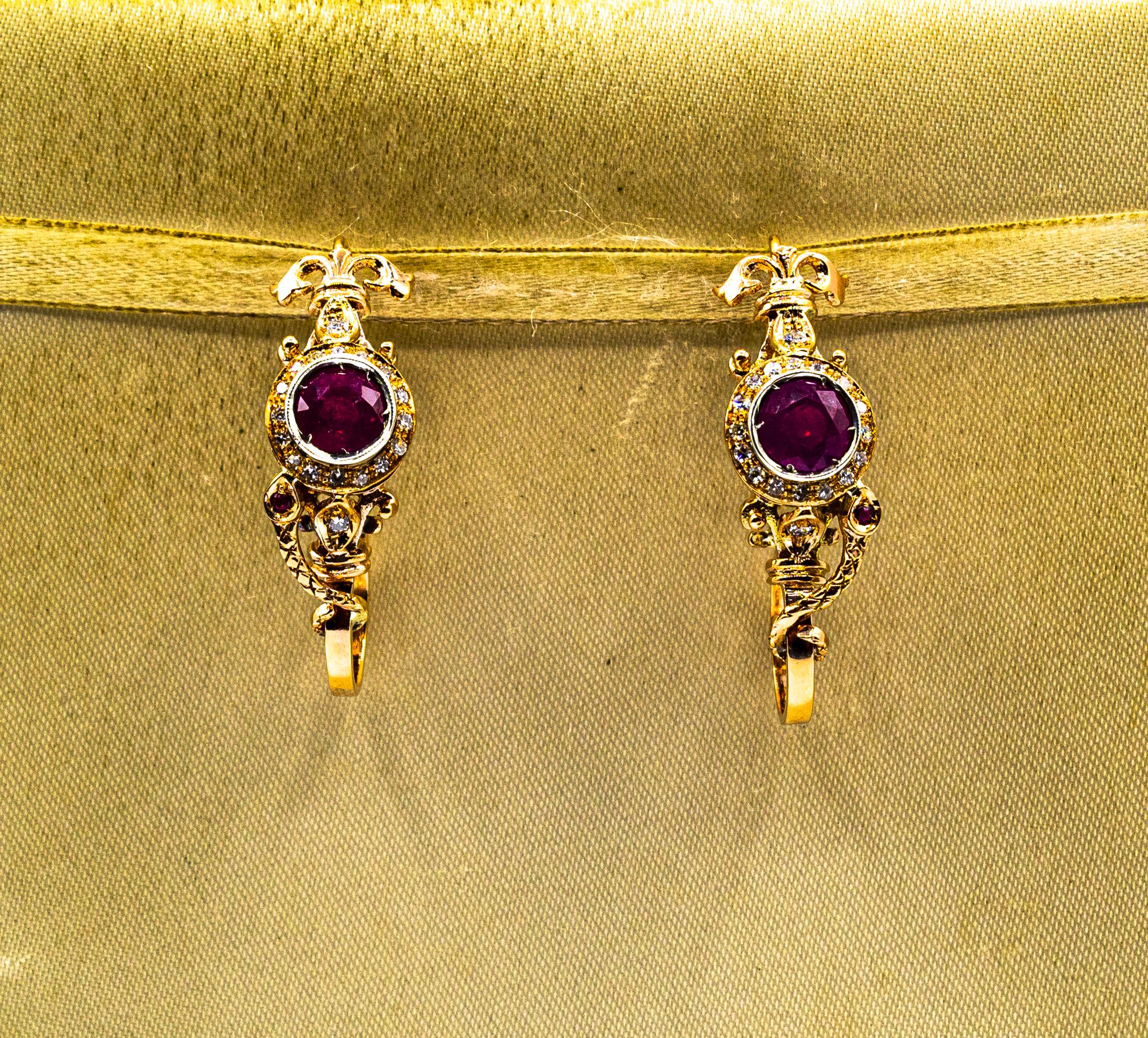 These Earrings are made of 9K Yellow Gold and Sterling Silver.
These Earrings have 0.40 Carats of White Brilliant Cut Diamonds.
These Earrings have also 3.41 Carats of Rubies.

These Earrings are available also with Emeralds or Blue Sapphires.

All