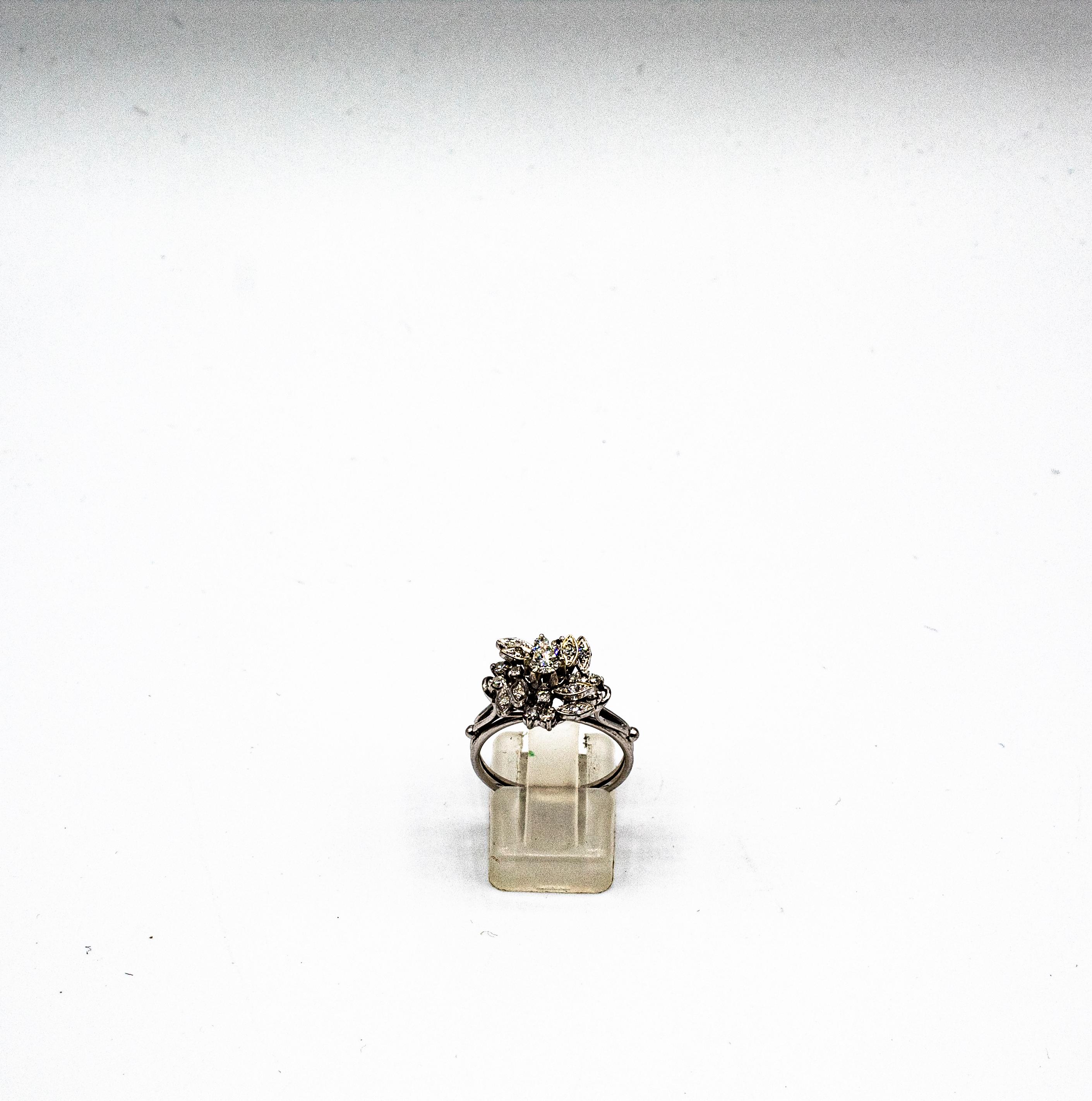 This Ring is made of 18K White Gold.
This Ring has a 0.20 Carats Central White Brilliant Cut Diamond.
This Ring has 0.25 Carats of White Brilliant Cut Diamonds.

Size ITA: 14 USA: 6 3/4

We're a workshop so every piece is handmade, customizable and