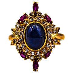 Art Deco Style White Diamond Blue Sapphire Ruby Yellow Gold Cocktail Ring Art Deco Style White Diamond Blue Sapphire Ruby Yellow Gold Cocktail Ring