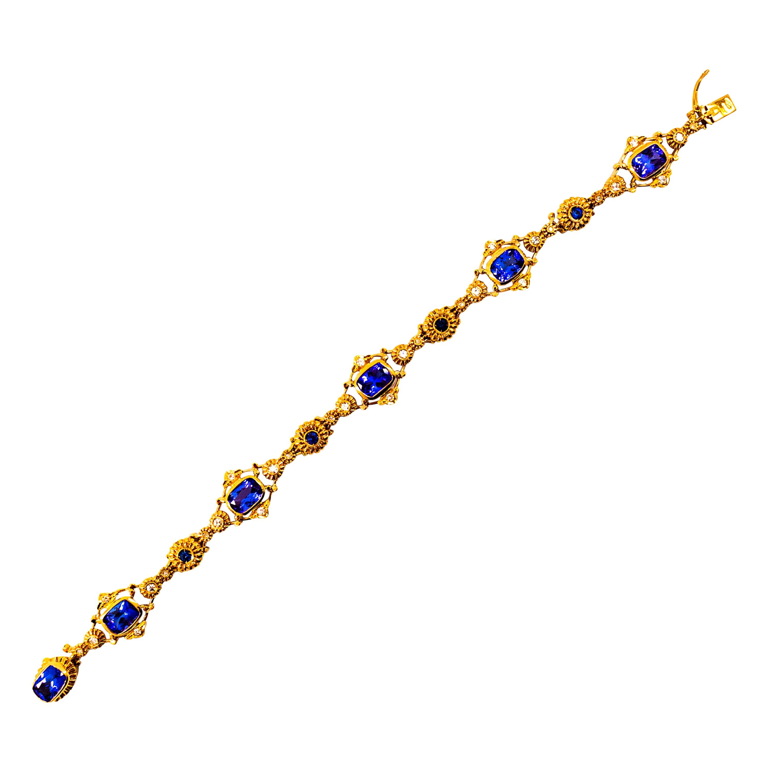 Bracelet en or jaune de style Art déco avec diamants blancs, saphirs bleus et tanzanites