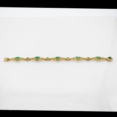 Art Deco Style Weißer Diamant Oktagonschliff Smaragd Gelbgoldarmband