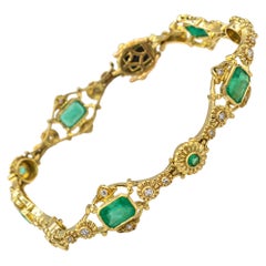 Art Deco Style Weißer Diamant Oktagonschliff Smaragd Gelbgoldarmband