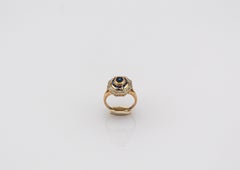 Art Deco Style White Diamond Oval Cut Blue Sapphire Yellow Gold Cocktail Ring