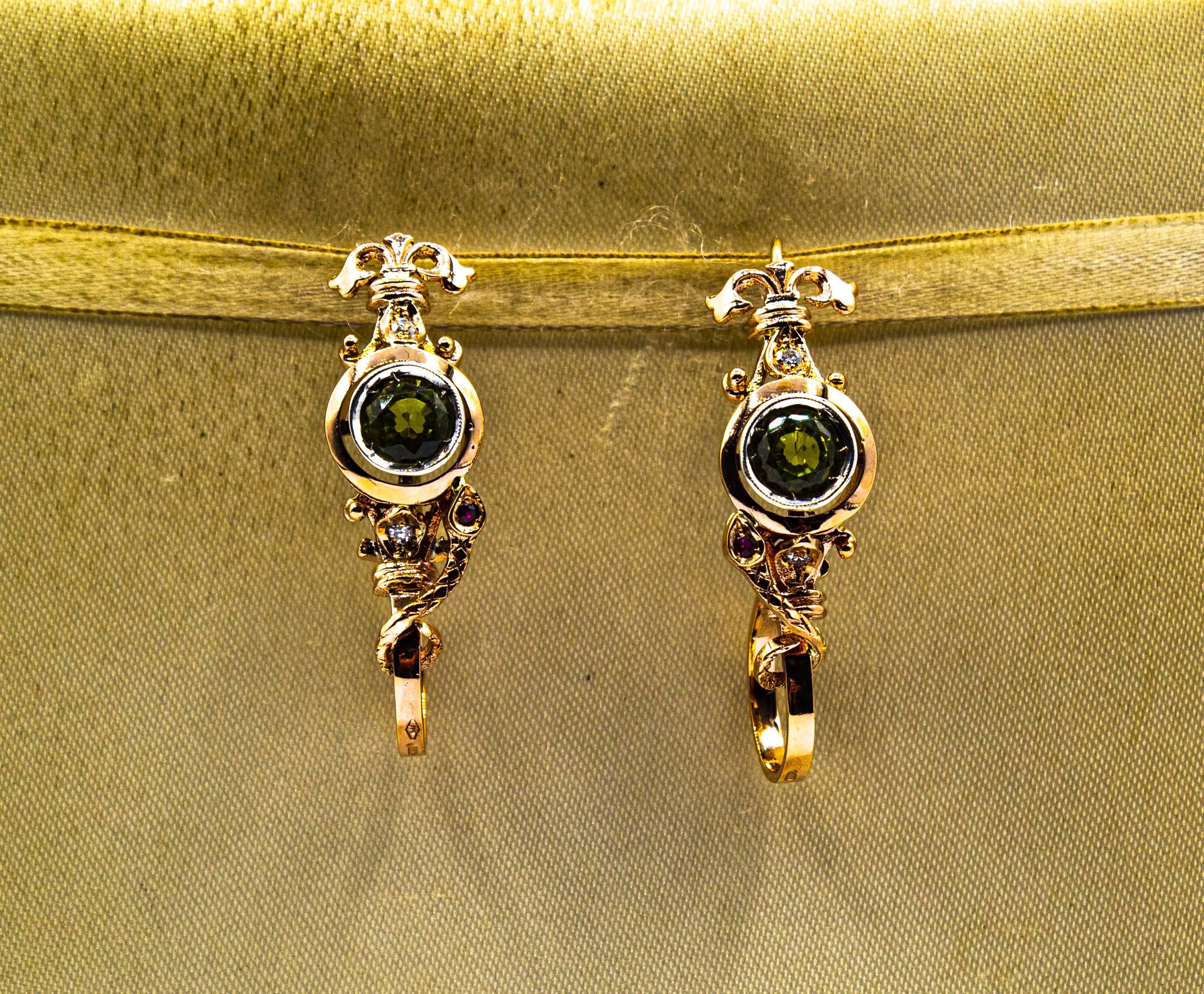 These Earrings are made of 9K Yellow Gold and Sterling Silver.
These Earrings have 0.08 Carats of White Old European Cut Diamonds.
These Earrings have 2.50 Carats of Peridots.
These Earrings have 0.08 Carats of Rubies.

These Earrings are available