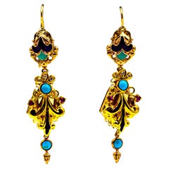 Boucles d'oreilles en goutte de style Art déco en or jaune, diamants blancs, rubis, turquoises et émail