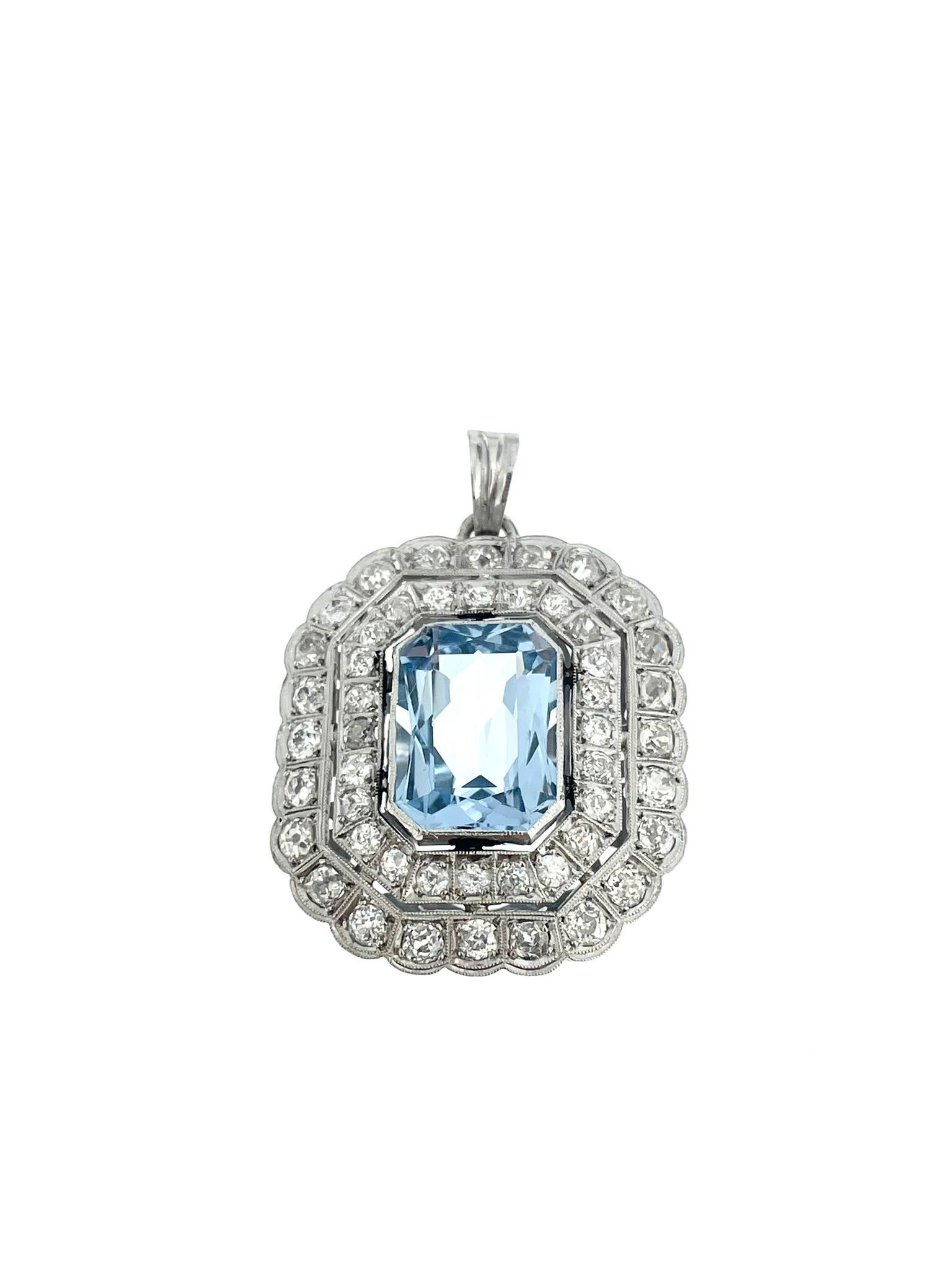 The Art Deco Style White Gold Pendant with Blue Spinel and Diamonds is a stunning piece of jewelry that captures the essence of the Art Deco era with its geometric lines, bold design, and luxurious materials. Crafted from 18-karat white gold, this