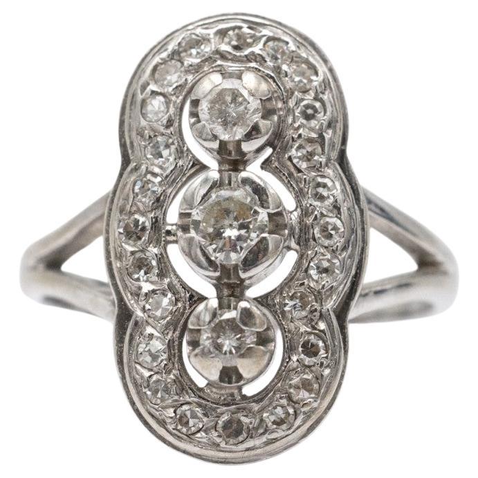 Art deco style white gold ring with diamonds. For Sale