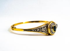 Pulsera de oro amarillo con diamantes blancos talla rosa y zafiro azul, estilo art déco