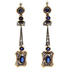 Boucles d'oreilles en goutte de style Art déco en or jaune avec diamants blancs et saphirs bleus taille rose