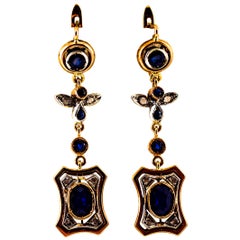 Pendientes de oro amarillo estilo art déco con diamante blanco talla rosa y zafiro azul