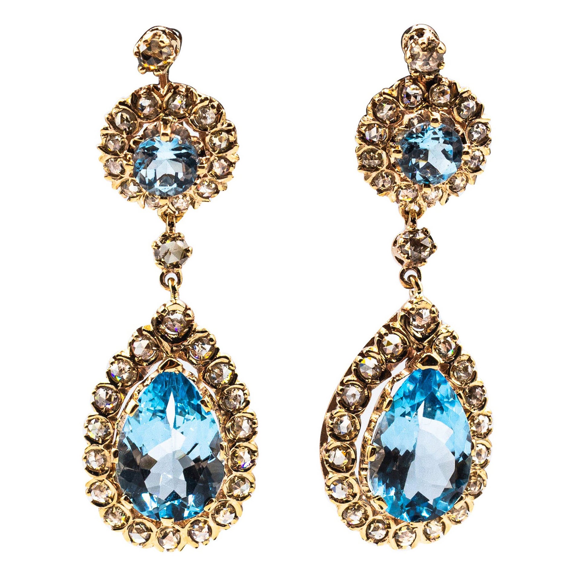 Boucles d
oreilles à levier de style Art déco en or jaune avec diamants blancs taille rose et topaze bleue