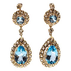 Orecchini a leva in oro giallo con diamante bianco taglio rosa e topazio blu in stile Art Deco