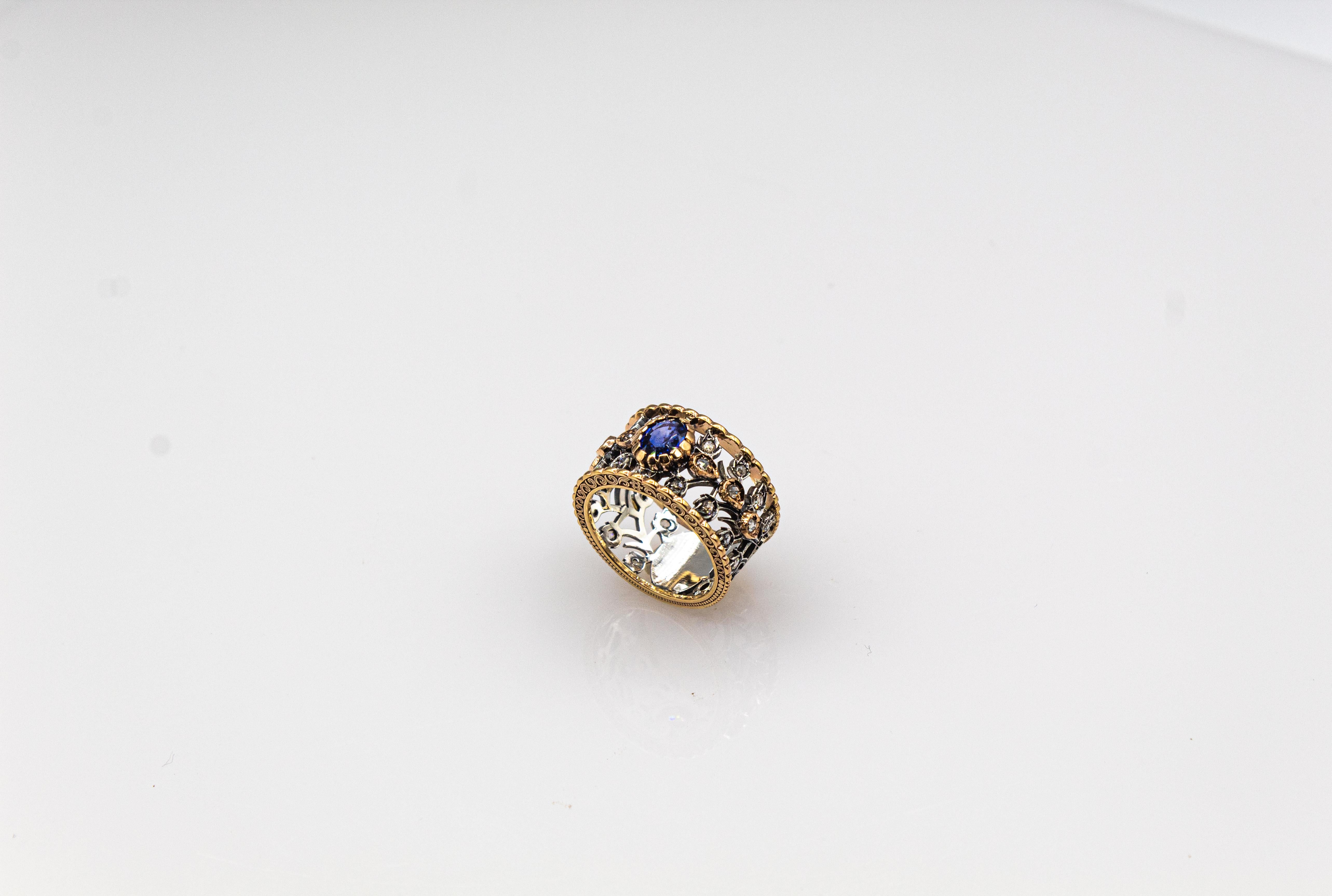 Women's or Men's Art Deco Style White Rose Cut Diamond Oval Cut Blue Sapphire Yellow Gold Ring For Sale