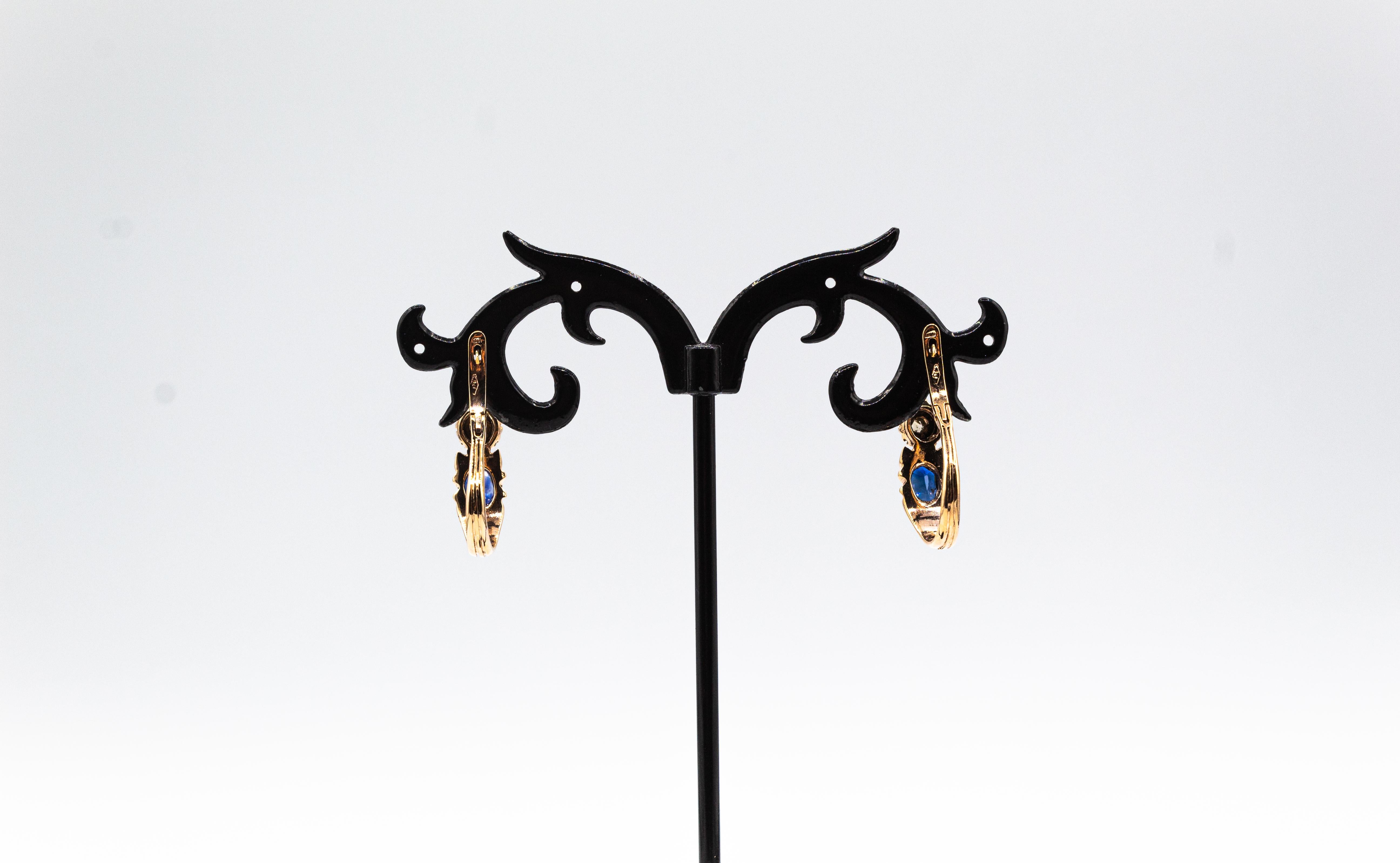 Pendants d'oreilles de style Art déco en or jaune avec diamants blancs taille rose et rubis taille ovale Unisexe en vente