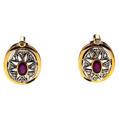 Pendants d'oreilles de style Art déco en or jaune avec diamants blancs taille rose et rubis taille ovale