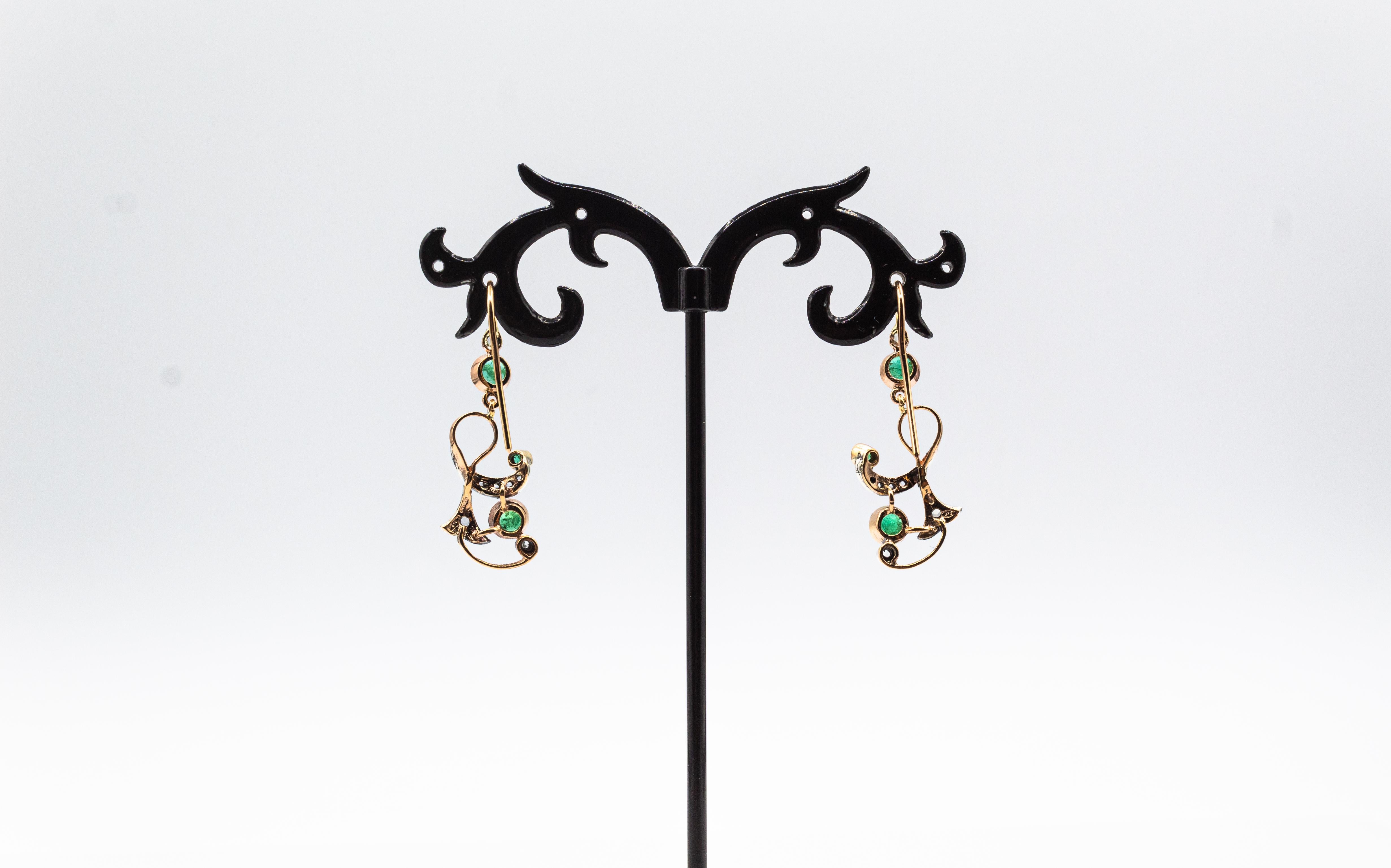 Boucles d'oreilles pendantes de style Art déco en or jaune avec diamants blancs taille rose et rubis en vente 1